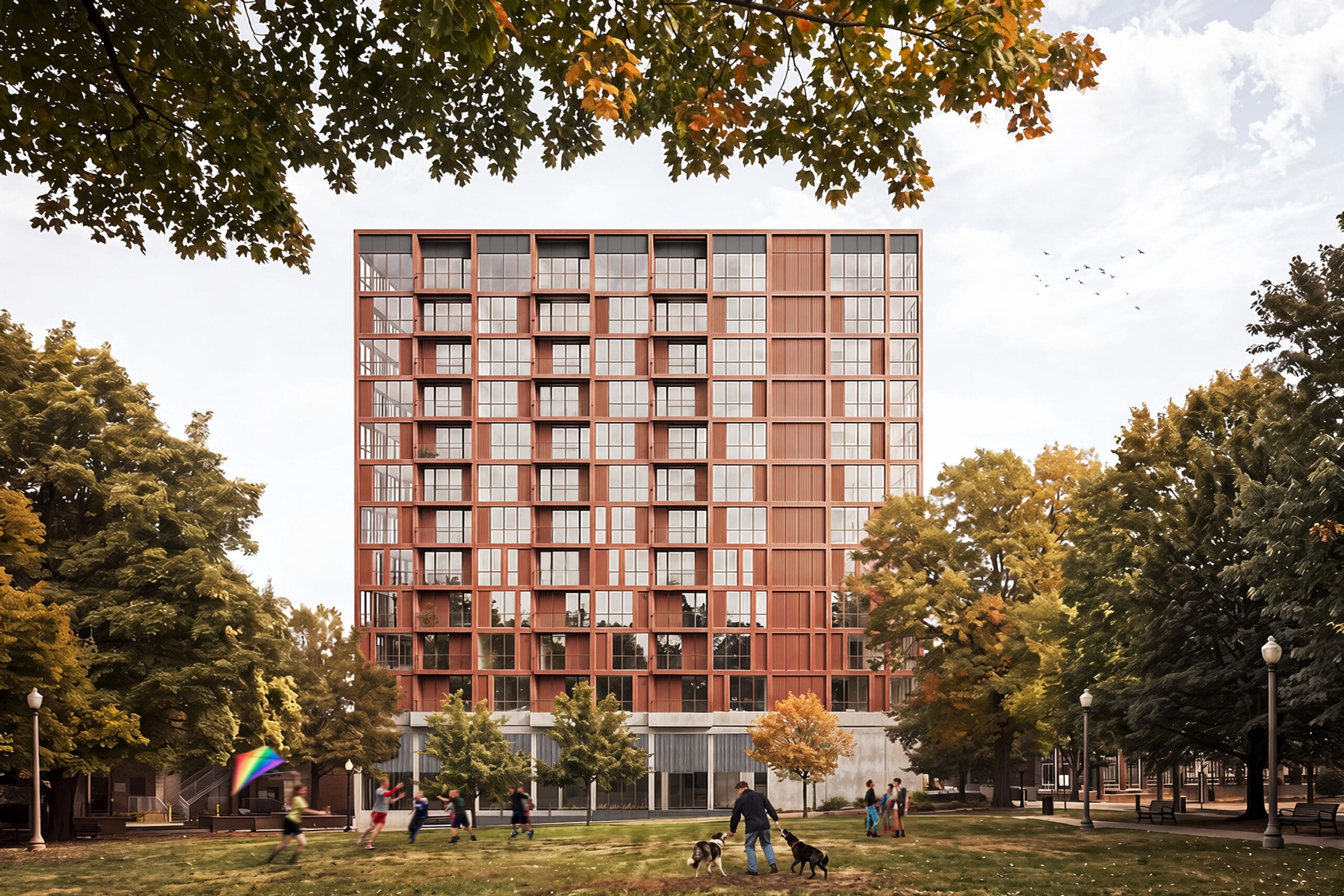 Bellwether apartment building viewed from the park with trees, pedestrians, and dogs in the foreground